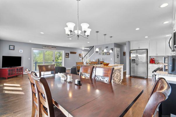Chandelier, Dining room, Interior, Kitchen, Pendant Lights, Recessed Lighting, Stainless Steel Appliances, Wood Texture Flooring