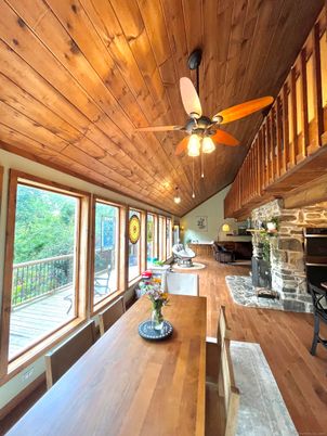 Dining room, Fireplace, Interior, Recessed Lighting, Wooden Ceilings, Wood Texture Flooring