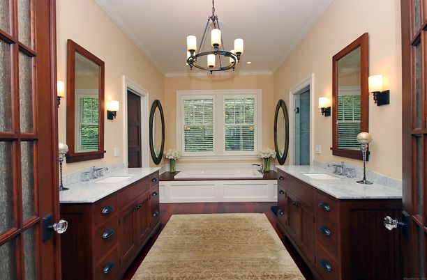 Bathroom, Chandelier, Dual Sink Vanities, Interior, Wood Texture Flooring