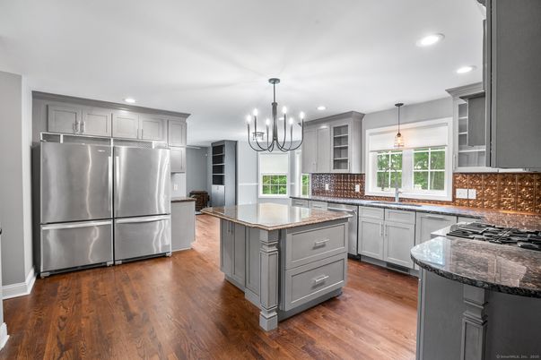 Chandelier, Interior, Kitchen, Pendant Lights, Recessed Lighting, Stainless Steel Appliances, Wood Texture Flooring