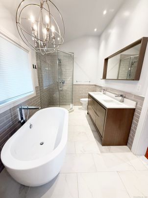 Bathroom, Chandelier, Dual Sink Vanities, Free Standing Baths, Glass Shower, Interior, Marble, Recessed Lighting
