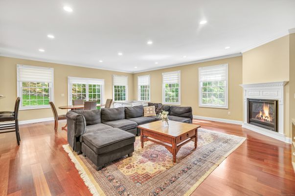 Dining room, Fireplace, Interior, Living room, Recessed Lighting, Wood Texture Flooring