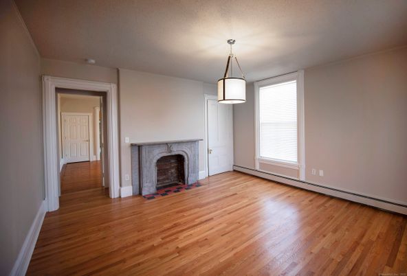 Empty room, Fireplace, Interior, Pendant Lights, Wood Texture Flooring