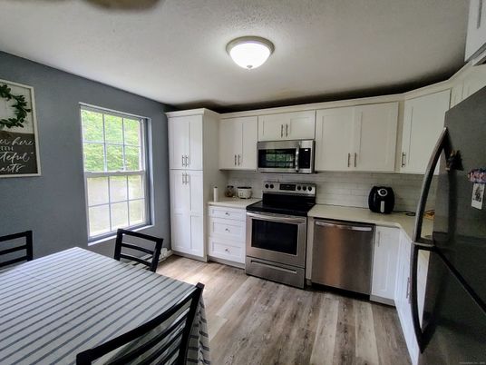 Dining room, Interior, Kitchen, Stainless Steel Appliances, Wood Texture Flooring