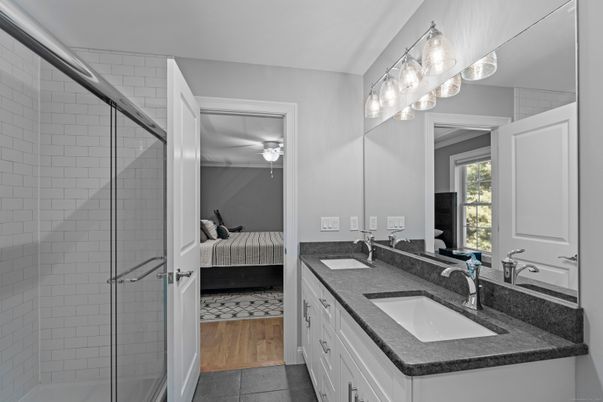 Bathroom, Bedroom, Dual Sink Vanities, Glass Shower, Interior, Wood Texture Flooring