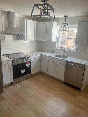 Interior, Kitchen, Pendant Lights, Stainless Steel Appliances, Wood Texture Flooring