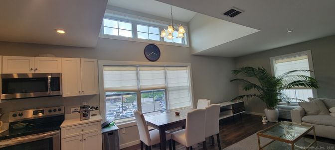 Dining room, Interior, Kitchen, Living room, Pendant Lights, Recessed Lighting, Stainless Steel Appliances, Wood Texture Flooring