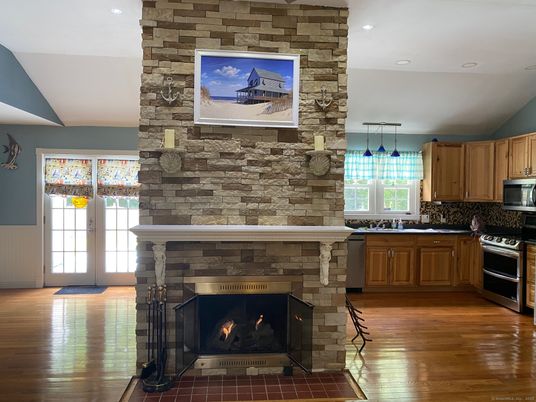 Fireplace, Interior, Kitchen, Pendant Lights, Recessed Lighting, Stone Walls, Wood Texture Flooring