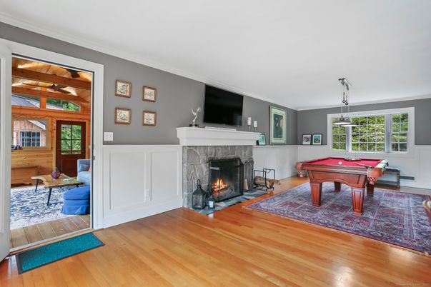 Billiard Table, Fireplace, Game Room, Interior, Pendant Lights, Wood Texture Flooring
