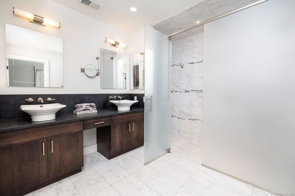 Bathroom, Dual Sink Vanities, Interior, Marble, Marble Walls, Recessed Lighting