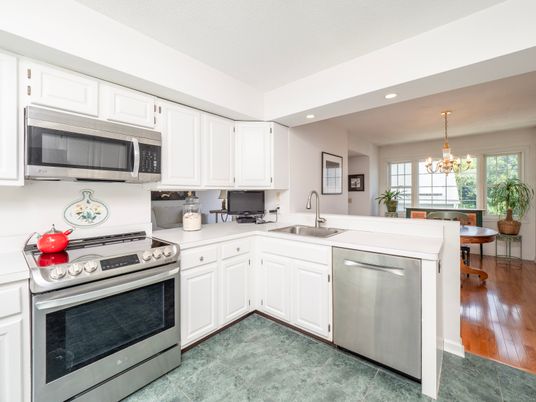 Chandelier, Dining room, Interior, Kitchen, Recessed Lighting, Stainless Steel Appliances, Wood Texture Flooring