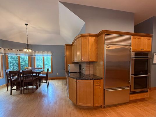 Dining room, Interior, Kitchen, Pendant Lights, Stainless Steel Appliances, Wood Texture Flooring