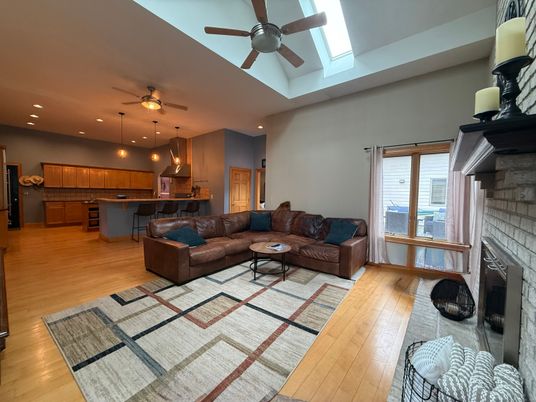 Fireplace, Interior, Kitchen, Living room, Pendant Lights, Recessed Lighting, Stone Walls, Wood Texture Flooring