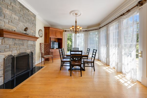 Chandelier, Dining room, Fireplace, Interior, Stone Walls, Wood Texture Flooring