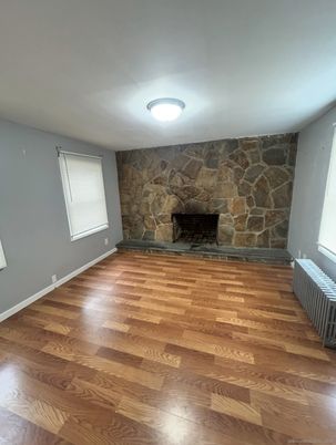 Empty room, Fireplace, Interior, Stone Walls, Wood Texture Flooring