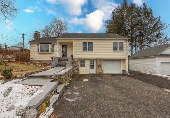 Attached, Exterior, Facade, Raised Ranch