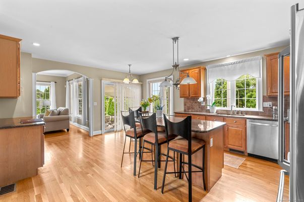 Dining room, Interior, Kitchen, Living room, Pendant Lights, Recessed Lighting, Stainless Steel Appliances, Wood Texture Flooring