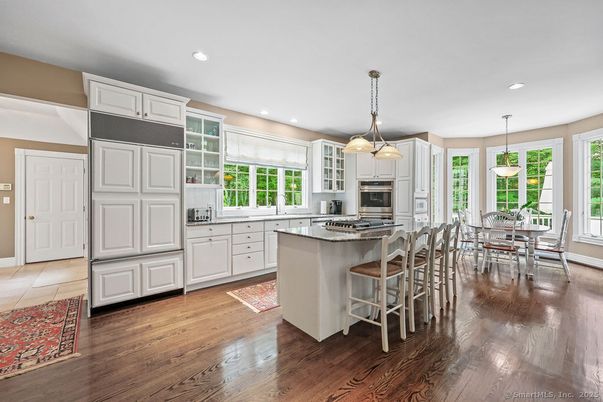 Dining room, Interior, Kitchen, Pendant Lights, Recessed Lighting, Stainless Steel Appliances, Wood Texture Flooring