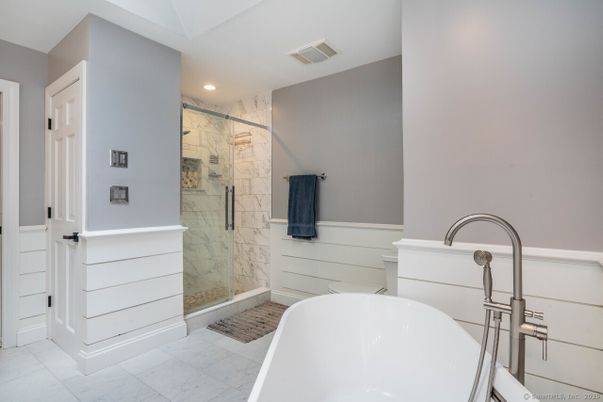 Bathroom, Free Standing Baths, Glass Shower, Interior, Marble, Marble Walls, Recessed Lighting