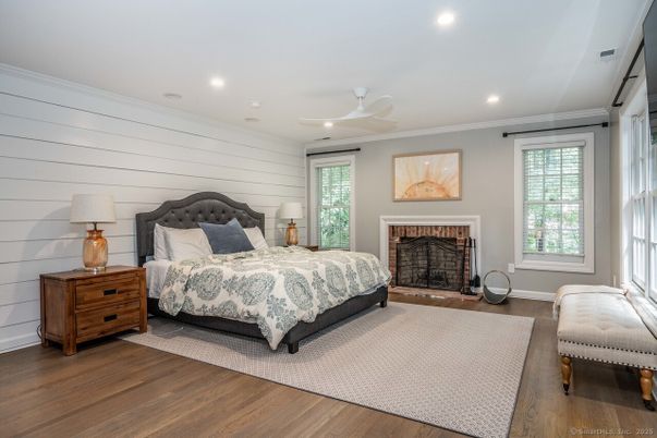 Bedroom, Fireplace, Interior, Recessed Lighting, Wood Texture Flooring