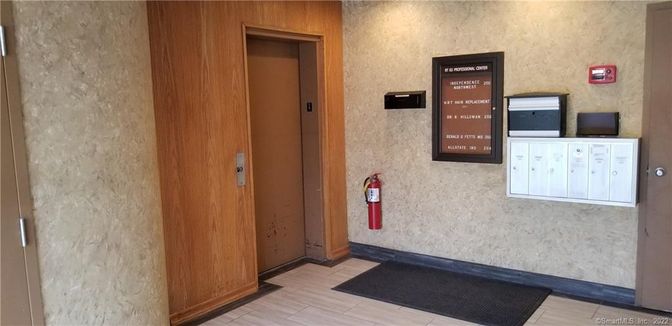 Elevator, Interior, Wood Texture Flooring