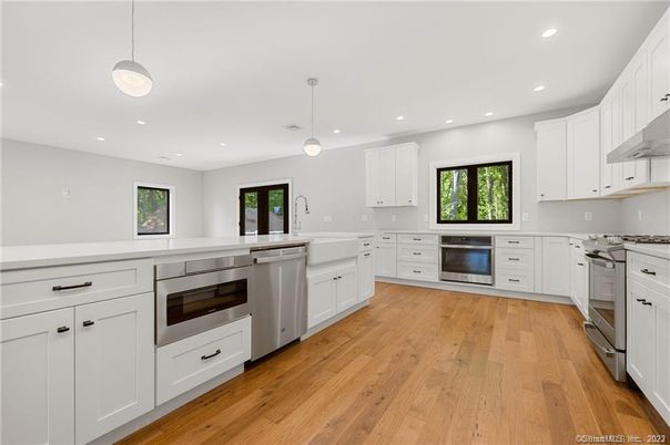 Interior, Kitchen, Pendant Lights, Recessed Lighting, Stainless Steel Appliances, Wood Texture Flooring
