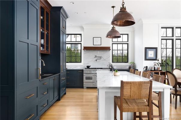 Interior, Kitchen, Marble Walls, Pendant Lights, Recessed Lighting, Stainless Steel Appliances, Wood Texture Flooring