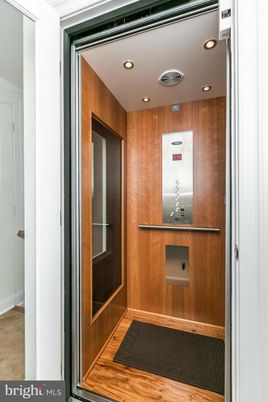 Elevator, Interior, Recessed Lighting, Wooden Walls