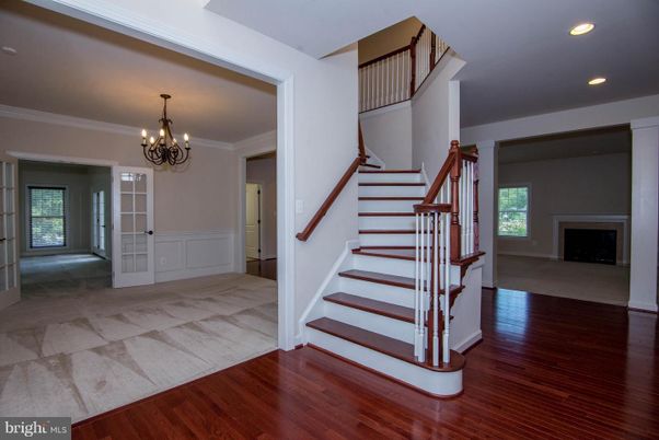 Chandelier, Fireplace, Interior, Recessed Lighting, Wood Texture Flooring