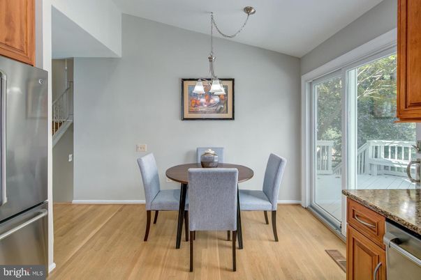 Dining room, Interior, Kitchen, Pendant Lights, Stainless Steel Appliances, Wood Texture Flooring