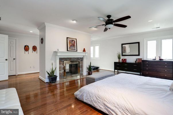 Bedroom, Fireplace, Interior, Recessed Lighting, Wood Texture Flooring