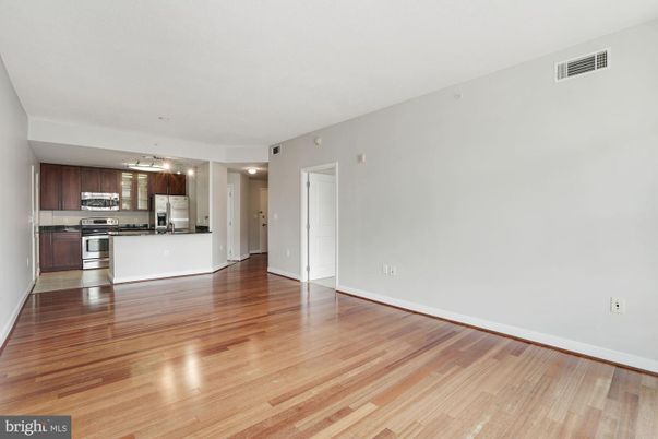 Empty room, Interior, Kitchen, Stainless Steel Appliances, Wood Texture Flooring