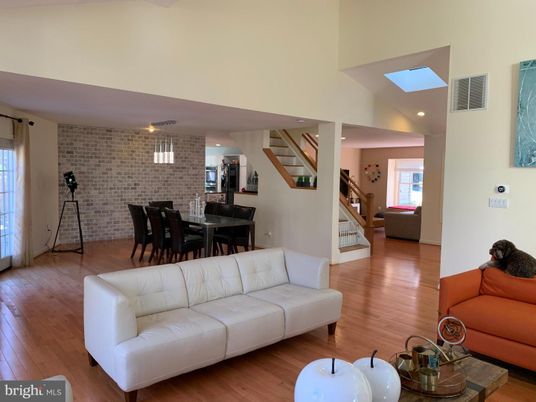 Dining room, Interior, Living room, Pendant Lights, Recessed Lighting, Stone Walls, Wood Texture Flooring