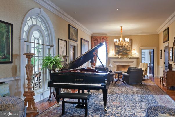 Chandelier, Fireplace, Interior, Living room, Piano, Recessed Lighting, Wood Texture Flooring