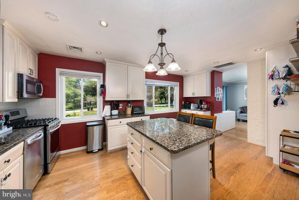 Chandelier, Interior, Kitchen, Pendant Lights, Recessed Lighting, Stainless Steel Appliances, Wood Texture Flooring