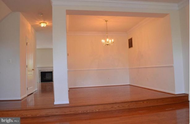 Chandelier, Empty room, Fireplace, Interior, Wood Texture Flooring