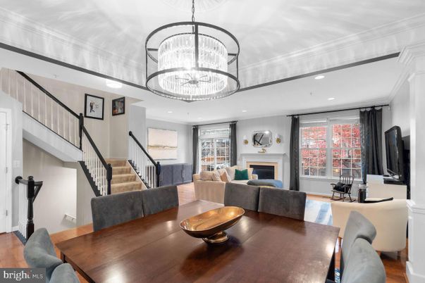Chandelier, Dining room, Fireplace, Interior, Living room, Recessed Lighting, Wood Texture Flooring