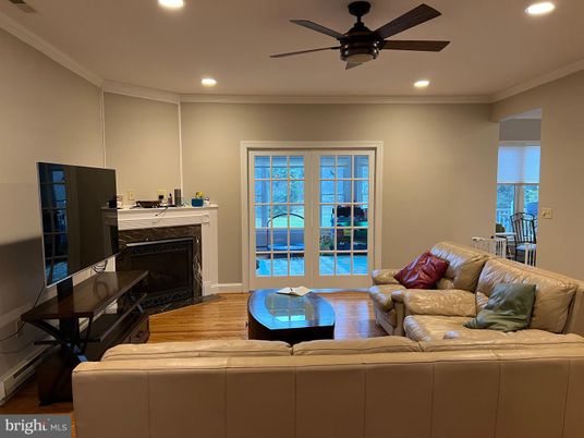 Fireplace, Interior, Living room, Recessed Lighting, Water, Wood Texture Flooring