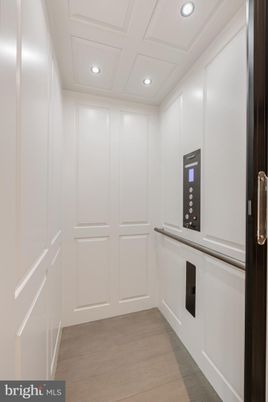 Elevator, Interior, Recessed Lighting, Wood Texture Flooring