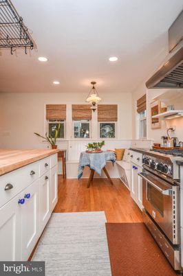 Dining room, Interior, Kitchen, Recessed Lighting, Stainless Steel Appliances, Wood Texture Flooring