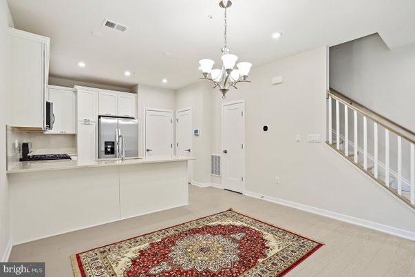 Chandelier, Interior, Kitchen, Recessed Lighting, Stainless Steel Appliances, Wood Texture Flooring