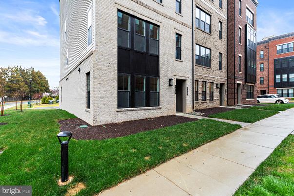 Exterior, Facade, Brick Facade, Condo Building