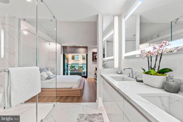 Bathroom, Bedroom, Dual Sink Vanities, Glass Shower, Interior, Marble, Recessed Lighting, Wood Texture Flooring