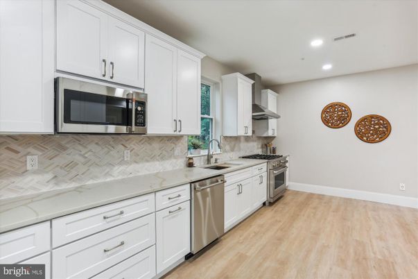 Interior, Kitchen, Recessed Lighting, Stainless Steel Appliances, Wood Texture Flooring