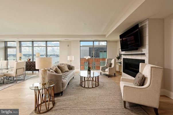 Fireplace, Interior, Living room, Recessed Lighting, Water, Wood Texture Flooring
