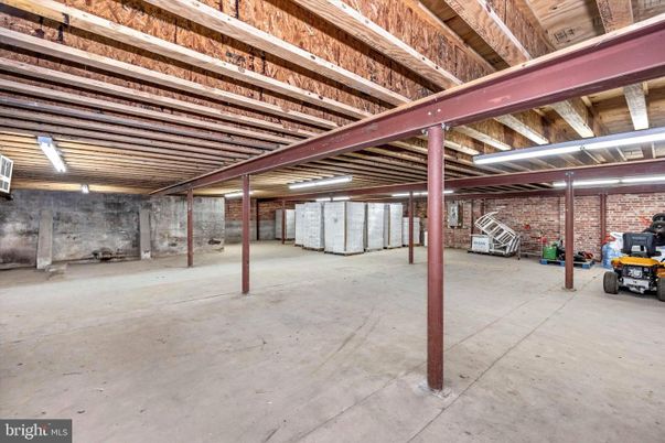Garage, Interior, Stone Walls, Wooden Beams