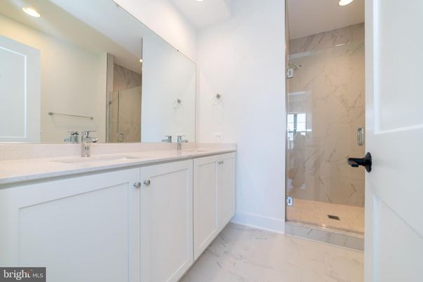 Bathroom, Dual Sink Vanities, Interior, Marble, Marble Walls, Recessed Lighting