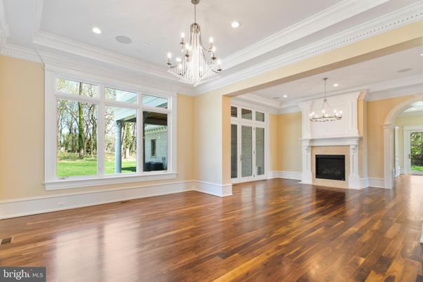Chandelier, Empty room, Fireplace, Interior, Recessed Lighting, Wood Texture Flooring