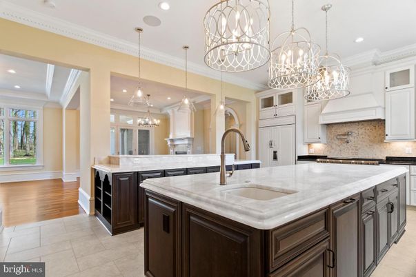 Chandelier, Interior, Kitchen, Pendant Lights, Recessed Lighting, Stainless Steel Appliances, Wood Texture Flooring