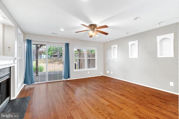 Empty room, Fireplace, Interior, Recessed Lighting, Wood Texture Flooring
